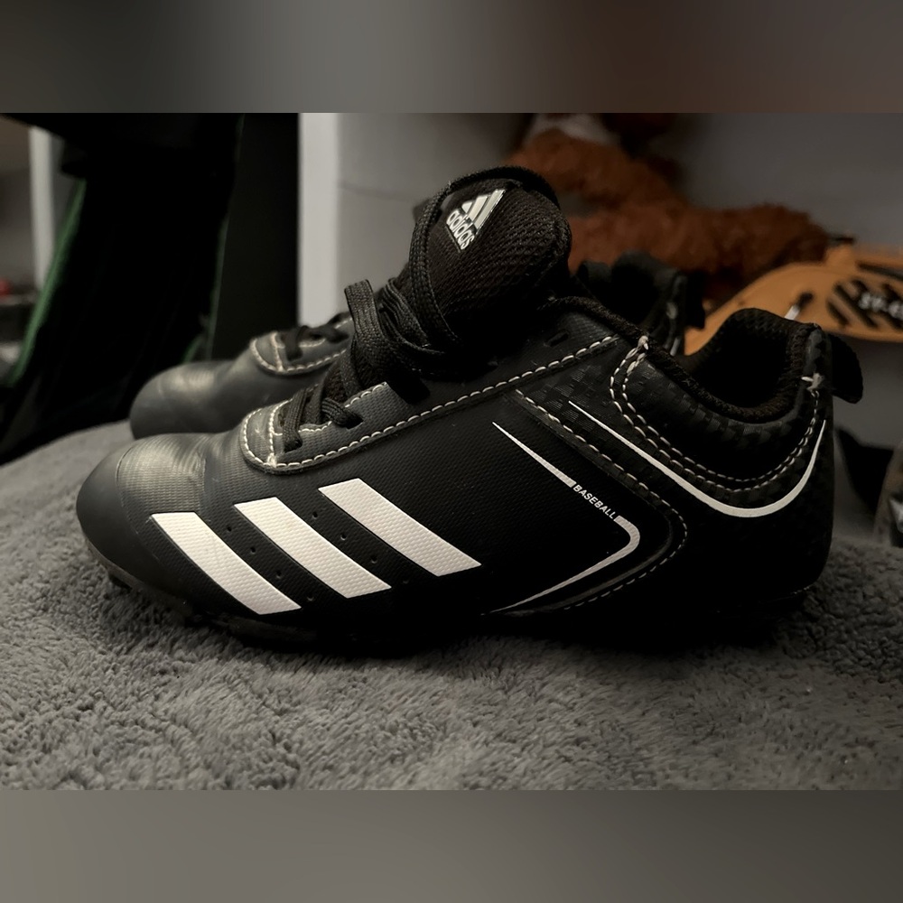 Adidas Black with side White striped Baseball Cleats size 12 for toddler ages 4t